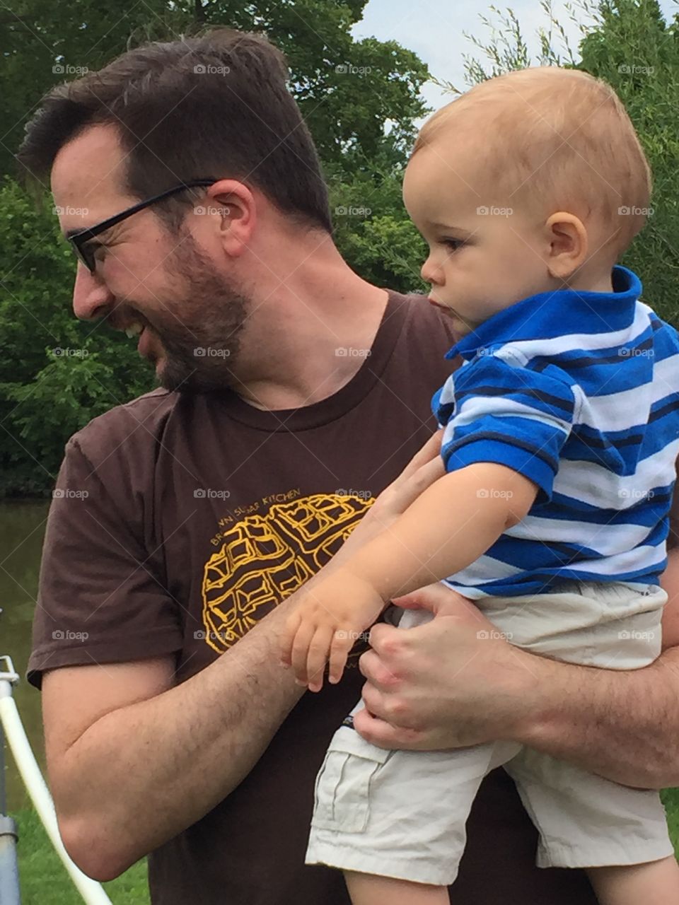 Father and Son Watching Ducks