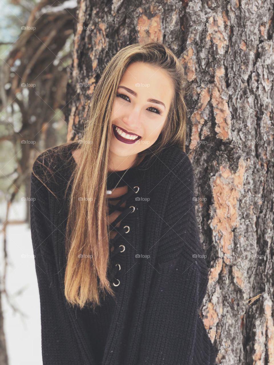 Young beauty enjoying the snowy season in the mountains of northern Arizona.
