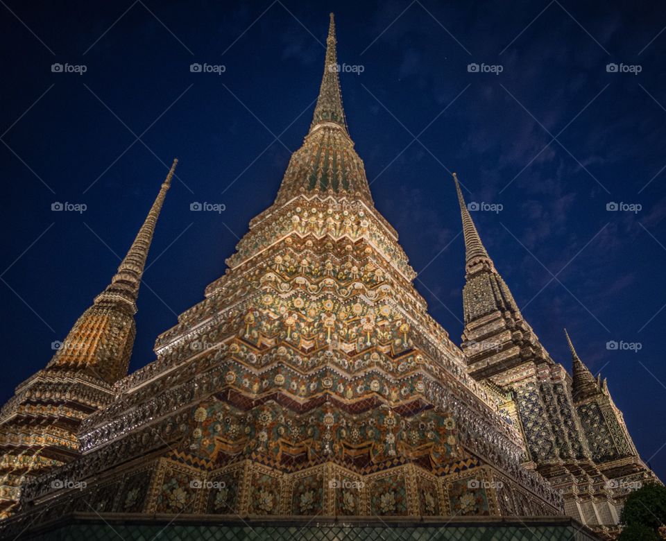 
Thai Beautiful temple in the night shot, Wat Pho also spelled Wat Po, is a Buddhist temple complex in Bangkok Thailand