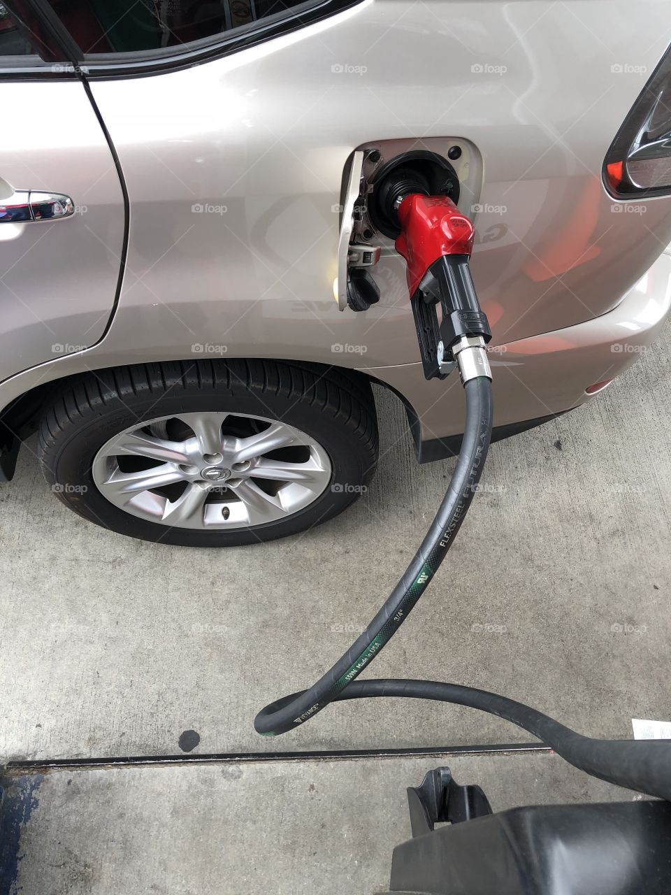 Gas station fueling suv car 