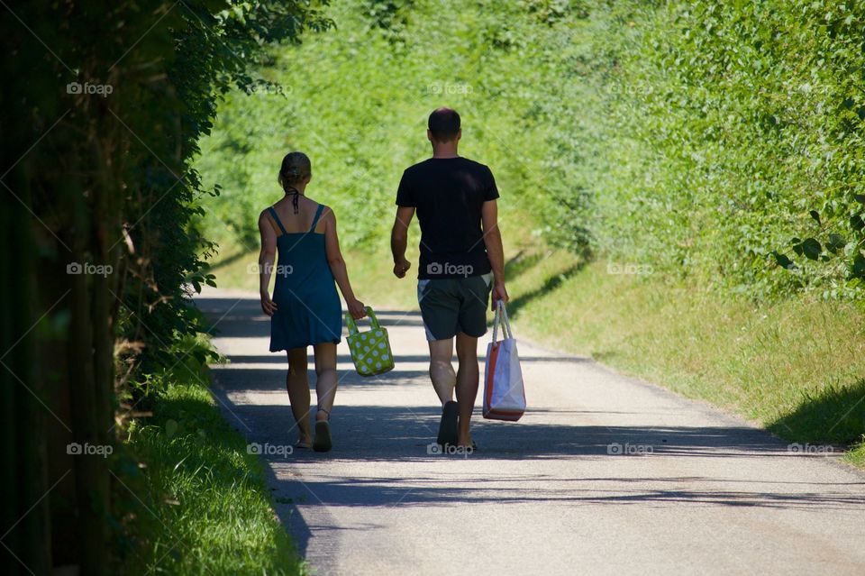 Couple Walking In The Nature