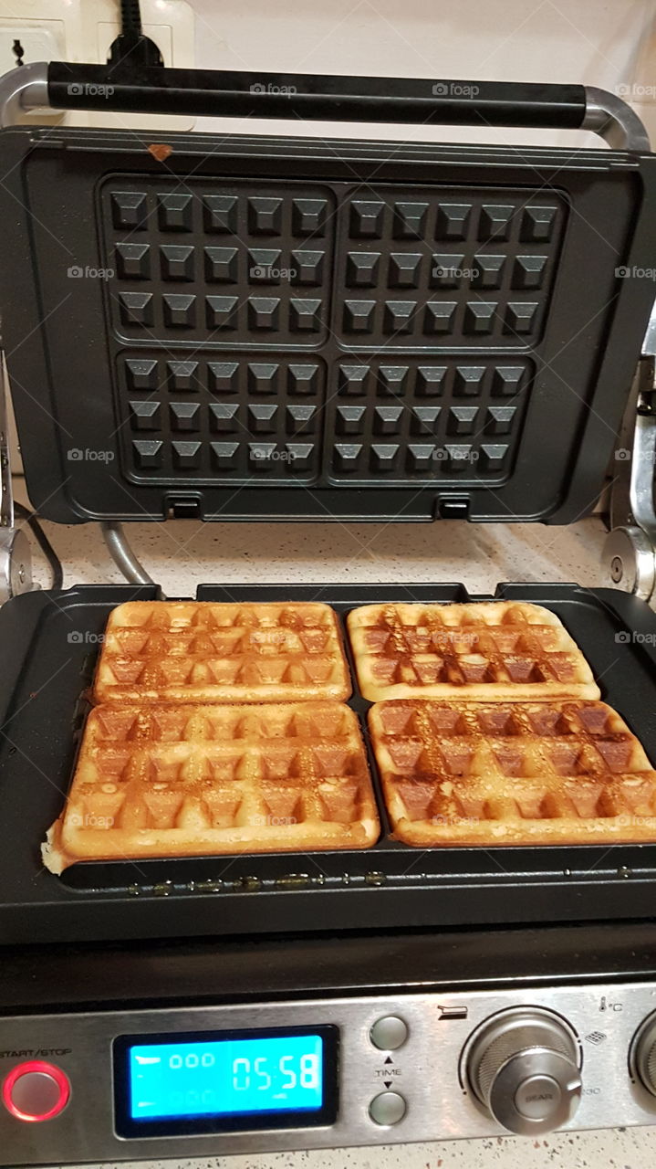 wafles in process of baking