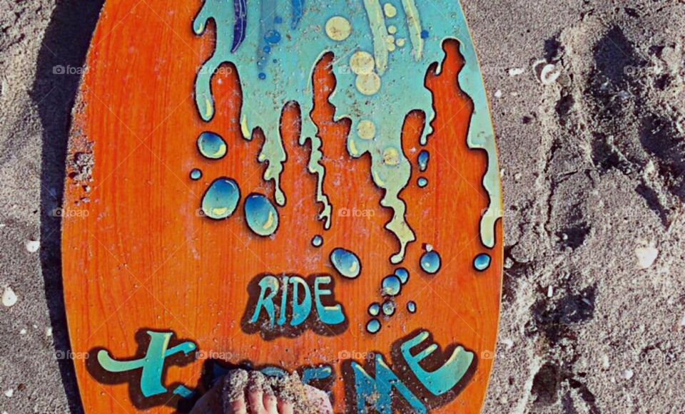 Riding a boogie board for fitness and fun.