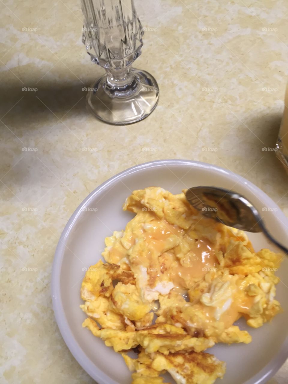 Morning ritual eating scrambled eggs