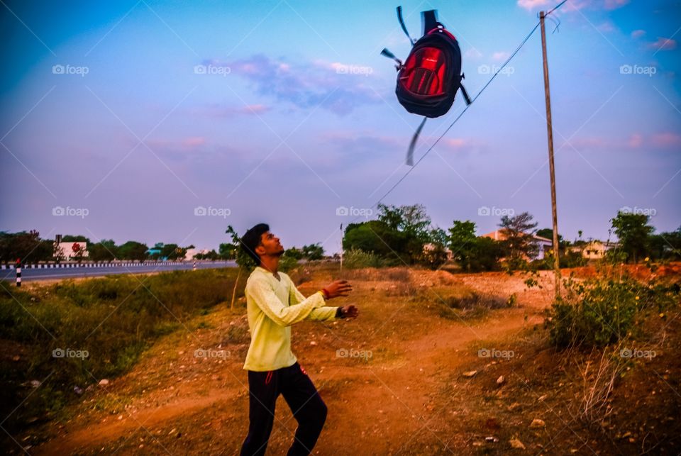 Guy playing with bag