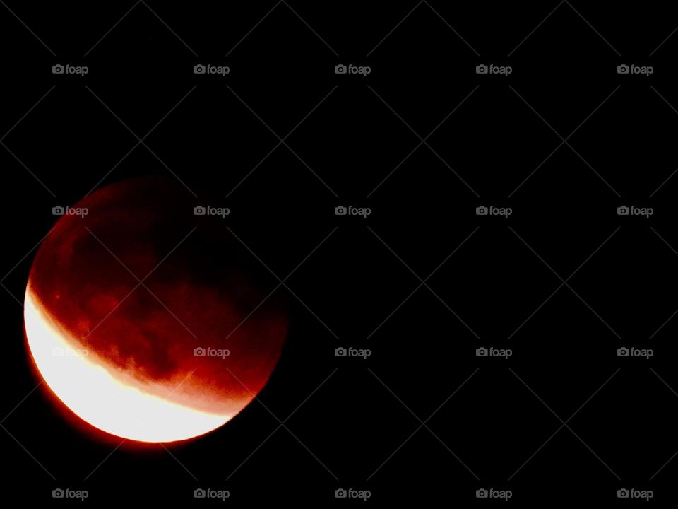 My photos of the Blood Moon, Total lunar eclipse on 15 May 2022 - Lunar eclipses occur when Earth aligns between the sun and the moon and casts a shadow across the lunar surface. The weather condition were very cloudy