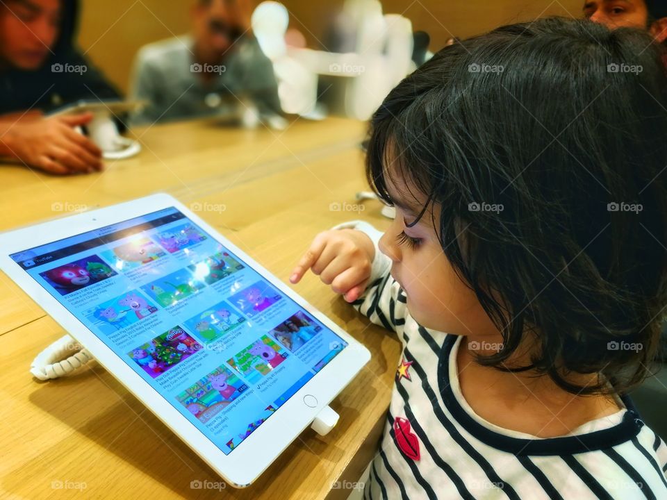 Child using tablet, Next Generation