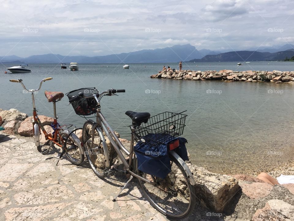 Bicycle parked near seaside