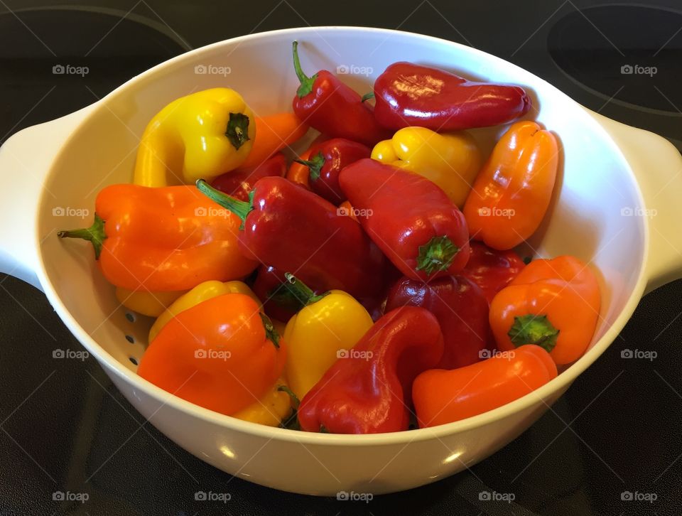 Peppers in a Bowl. Colorful peppers in a bowl.  