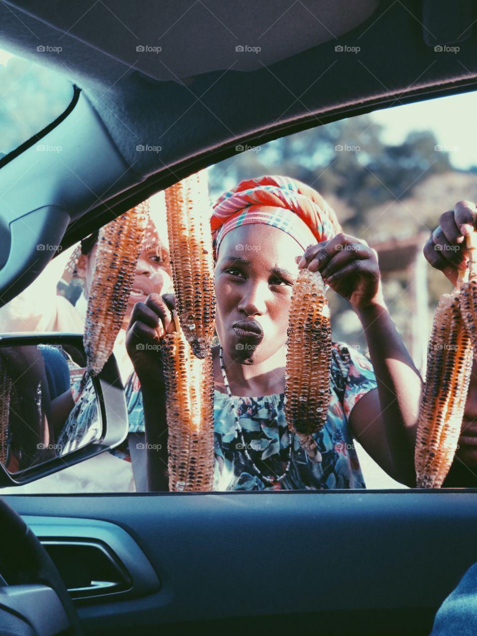 Buying corn in the dusty roadside of the rural Transkei in South Africa 