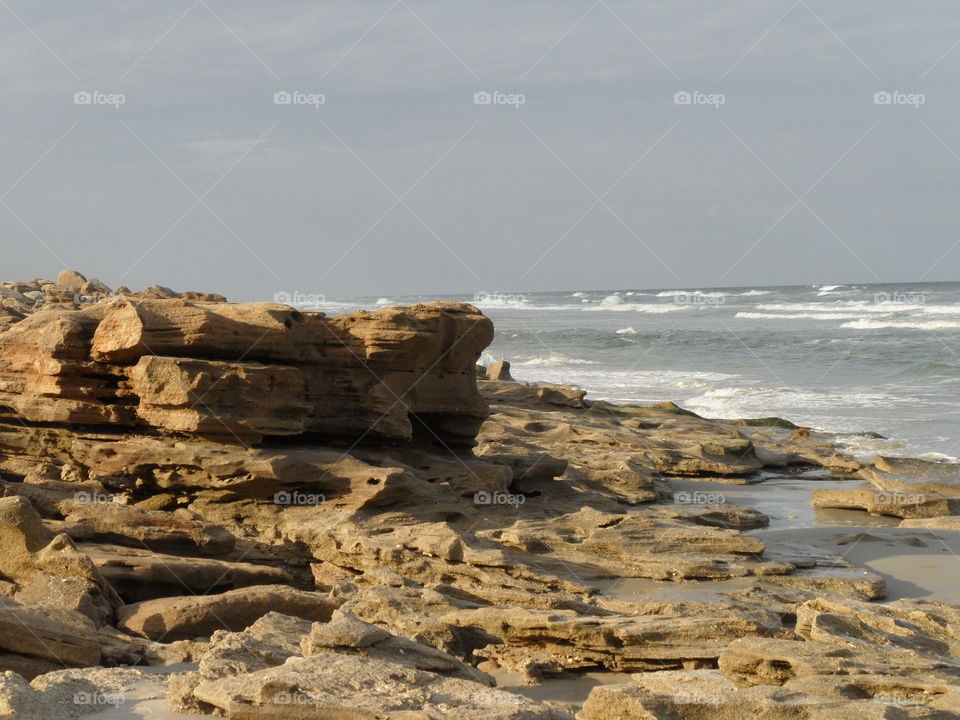 cliff and a rocky beach