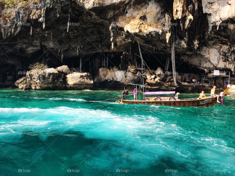 green clear sea water in front of Viking cave in Phi Phi island Krabi,Thailand 