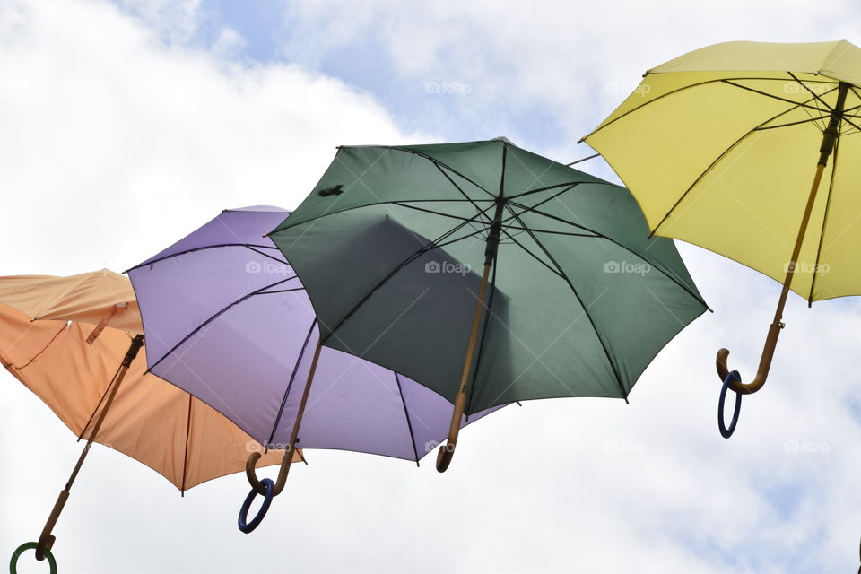 Umbrellas in the sky