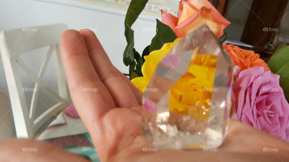 quartz crystal in hand