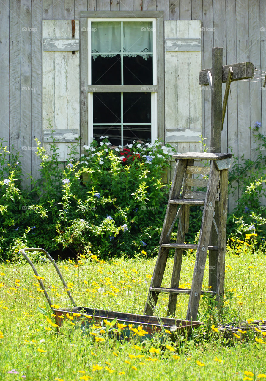 Rustic outside decor in front of window