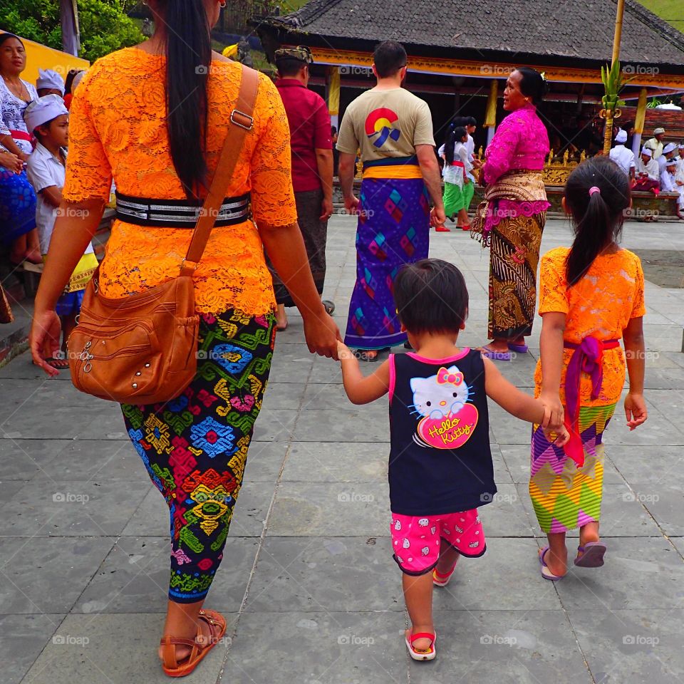 Beautiful orange ceremony attire in Bali 