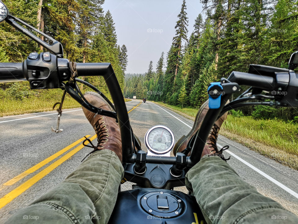 feet up riding through Montana forests