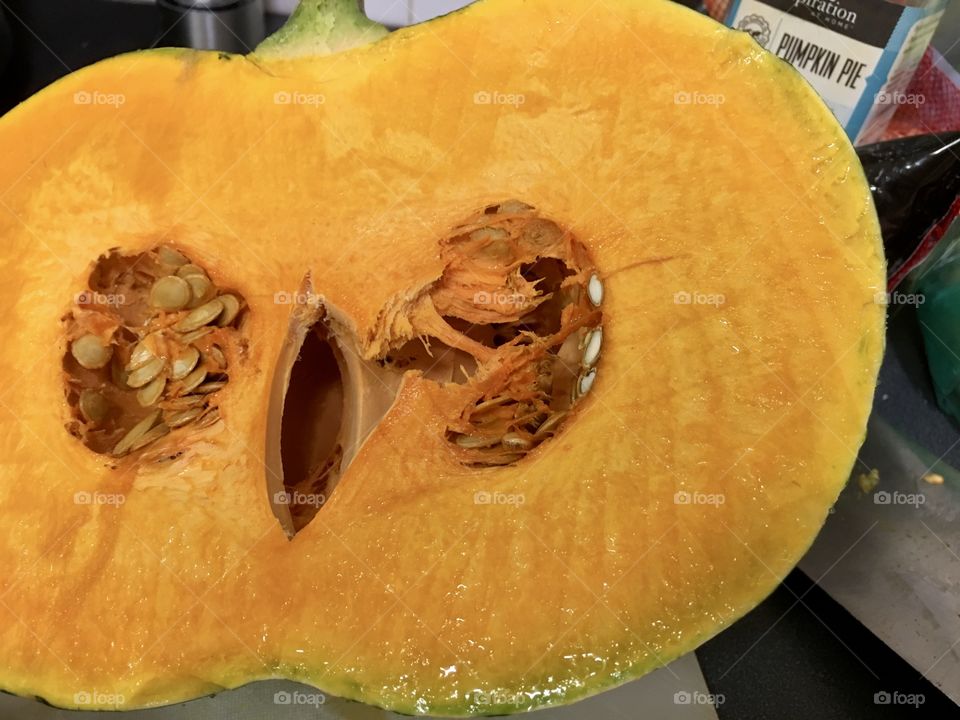 Halved orange squash pumpkin closeup