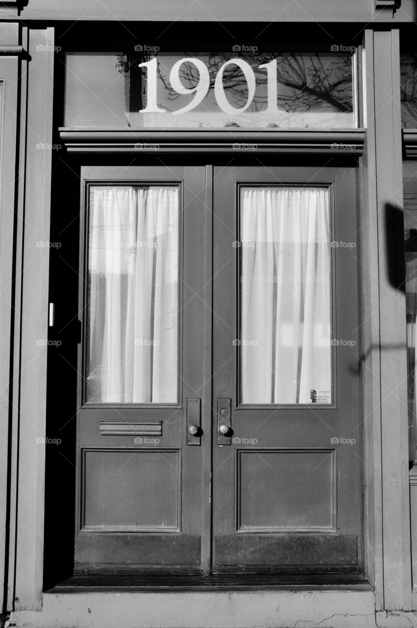 A black and white image of a door on the Southside in Pittsburgh Pennsylvania 