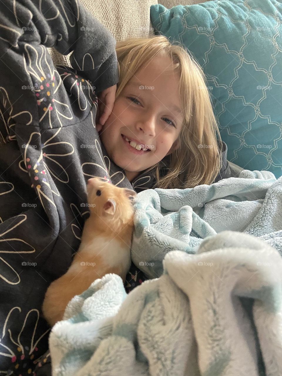 Just a girl and her favorite pet hamster named Chelsea! 