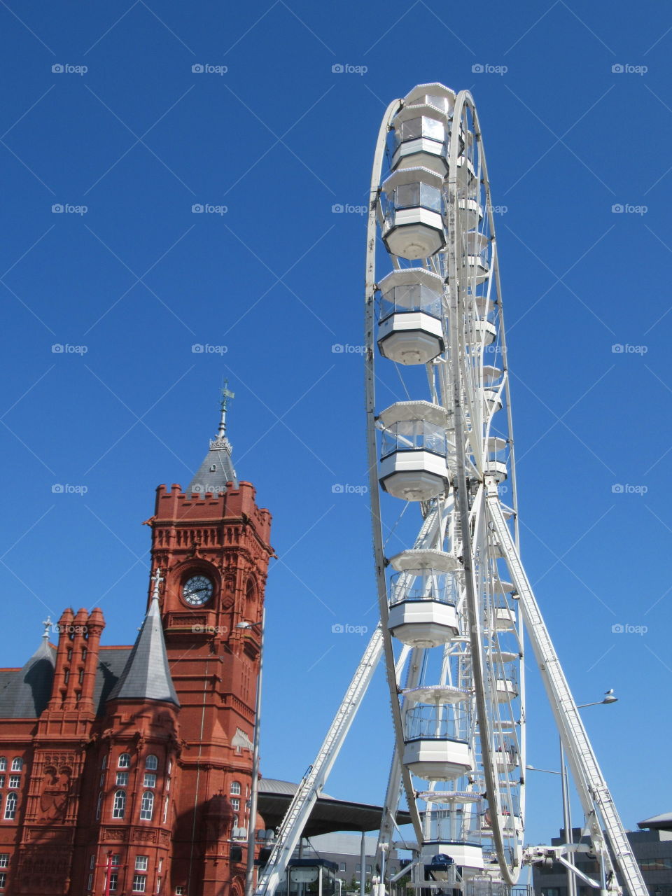 Pierhead building looking very small next to the Ferris wheel at Cardiff bay