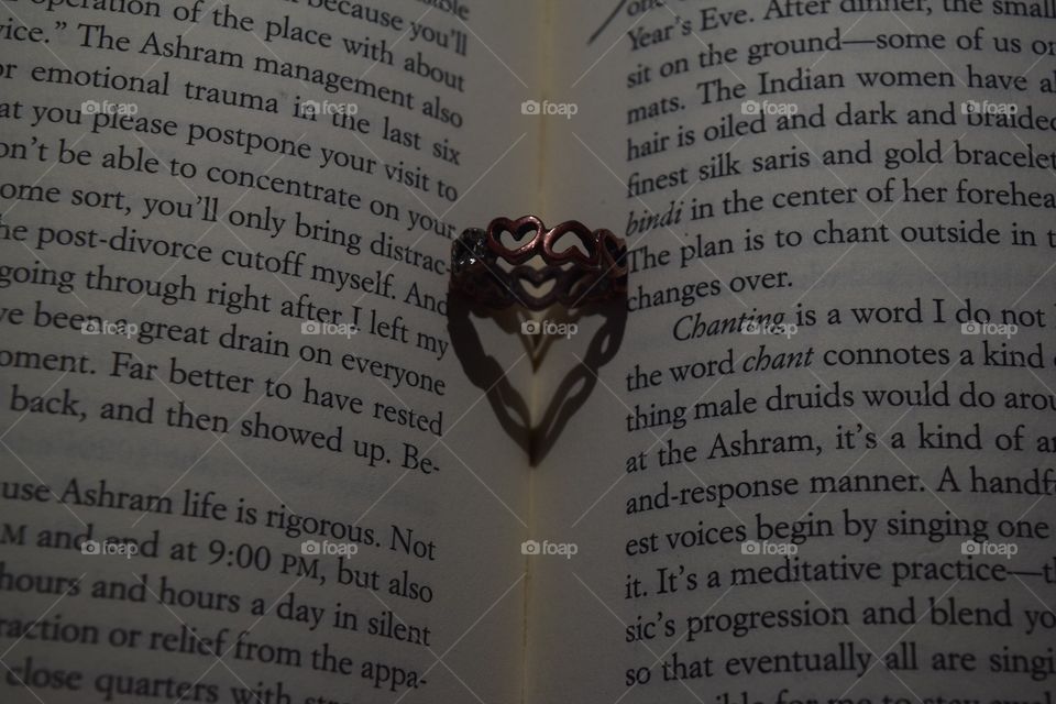 Shadow of a heart ring in Eat, Pray, Love