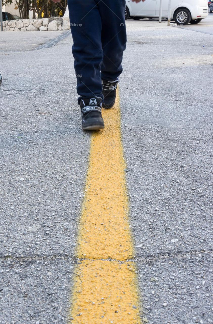 Walking along the yellow line