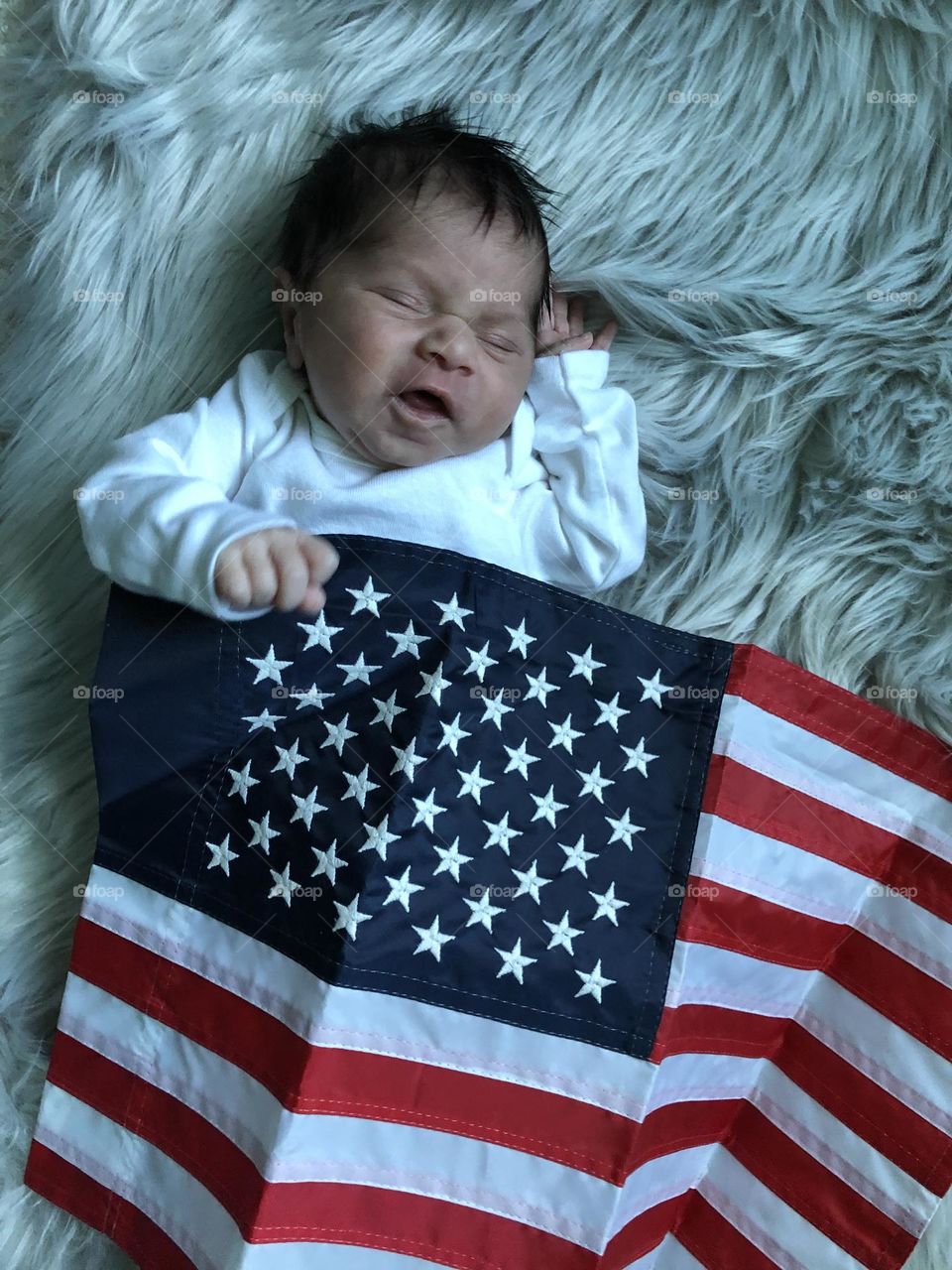 Baby sleeping with United States of America flag, cute baby with USA flag, American baby photo, celebrating 4th of July, celebrating voting in America, baby and democracy, infant with American flag 
