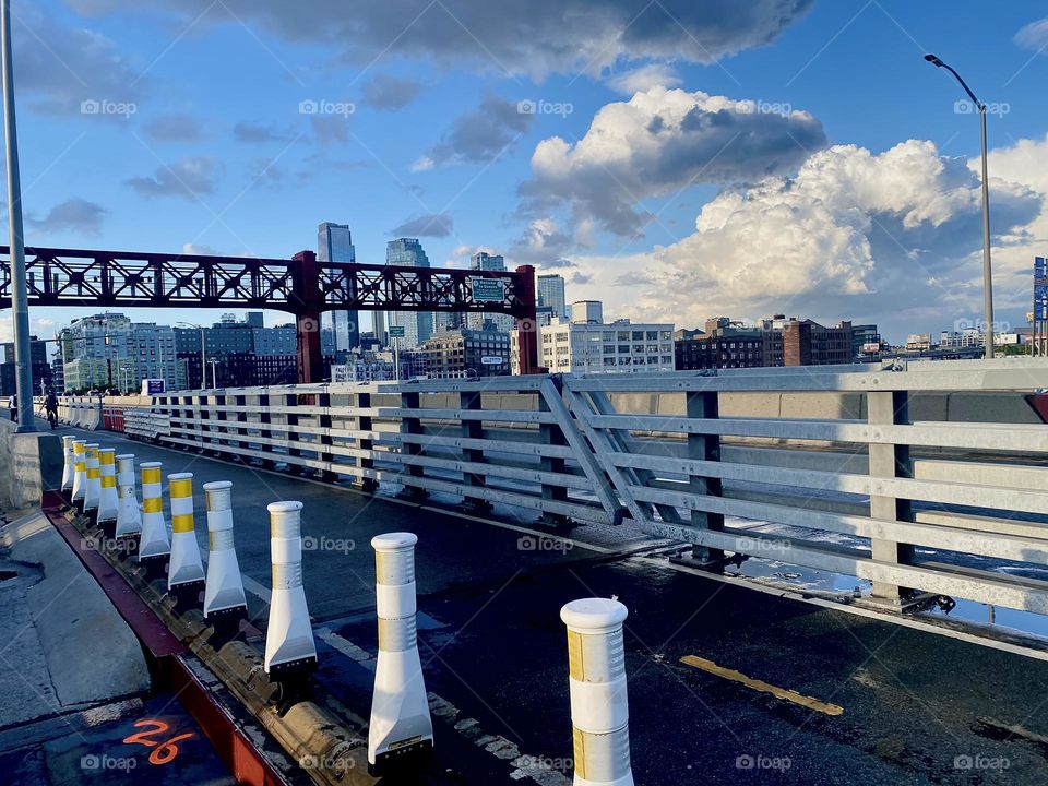 The “Pulaski Bridge” at “Newtown Creek” in “New York City” looks even more picturesque during the golden hour before sunset. All the structural elements of the image take on even greater plasticity at this special time. 2023. Hypnotic Productions