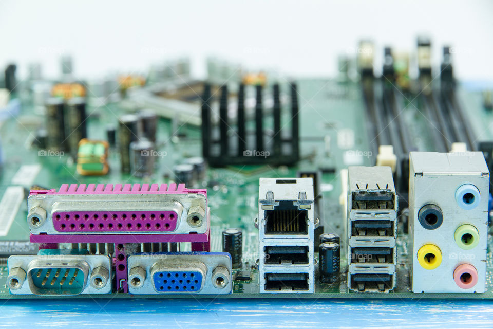 close up of computer motherboard, back view of connectors