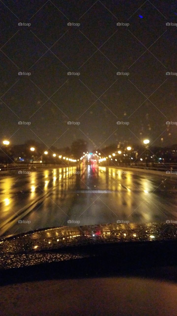 Glowing Streetlights on a Rainy Night