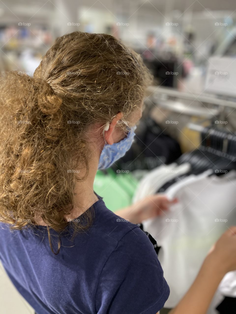 Shopping clothes with a mask 