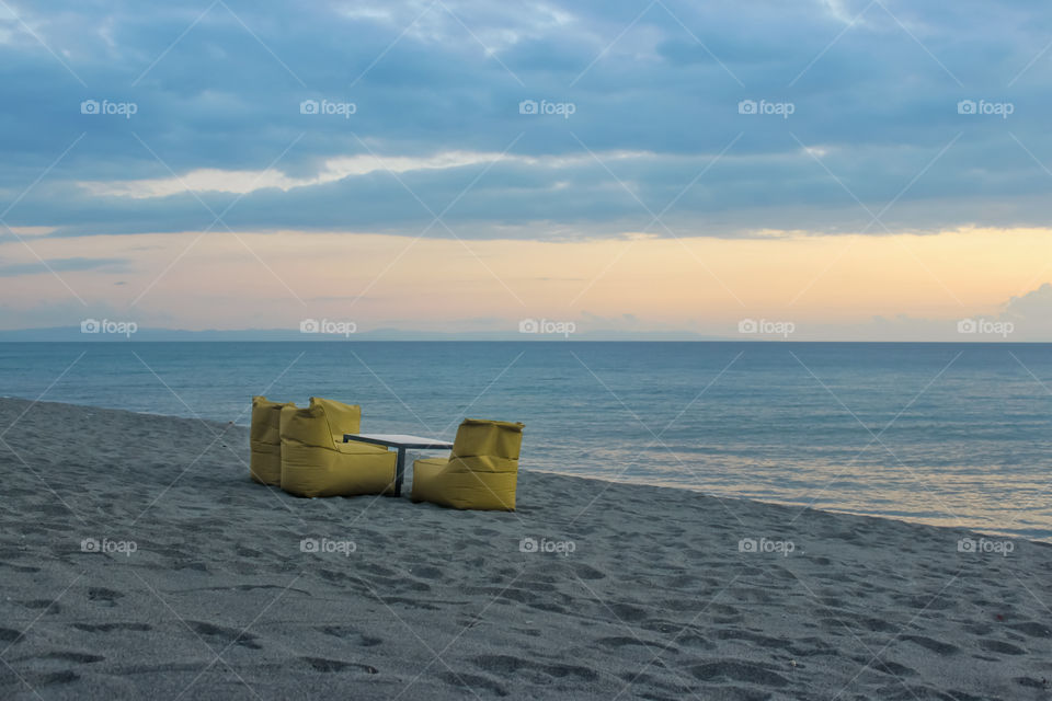 Empty chairs on the beach