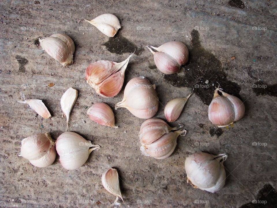 Some garlic scattered after being harvested in bird angle view