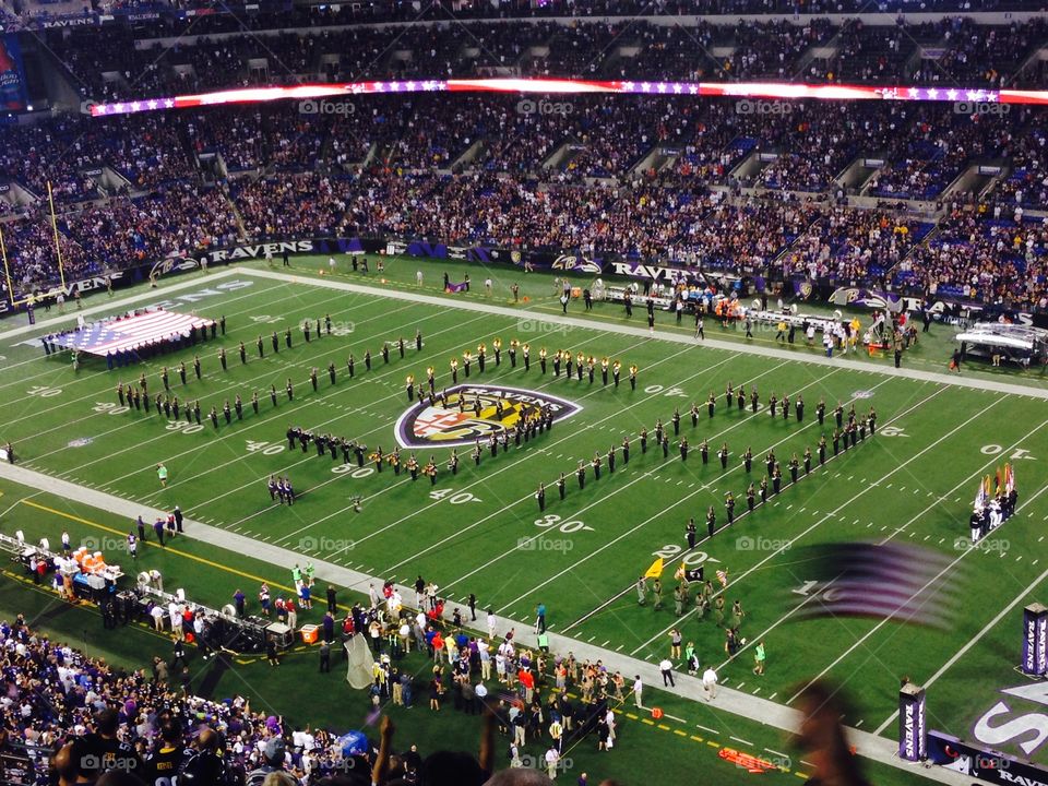 USA. Photo of marching band spelling out USA during Baltimore Ravens football game at M&T Bank Stadium.