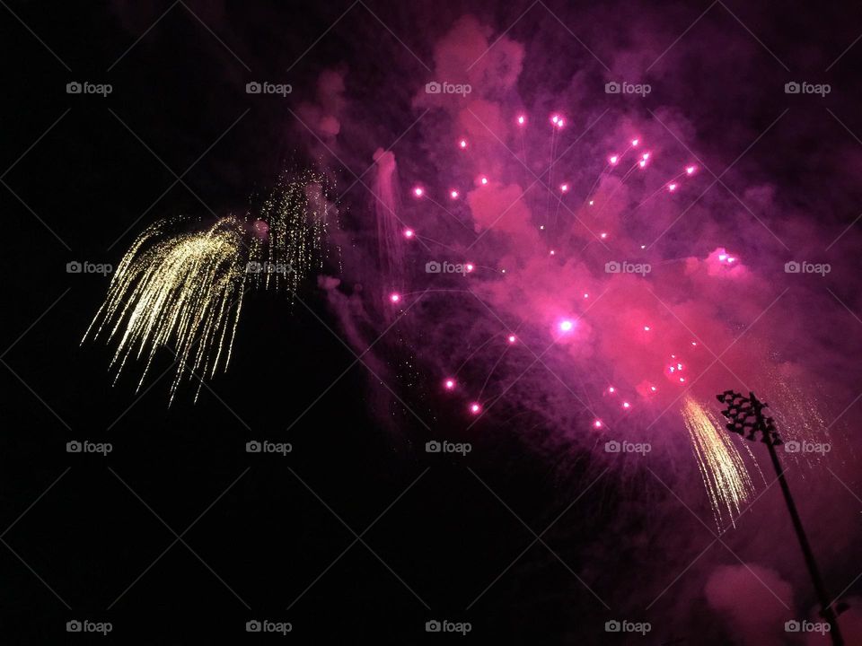 Bright beautiful fireworks in the night sky.