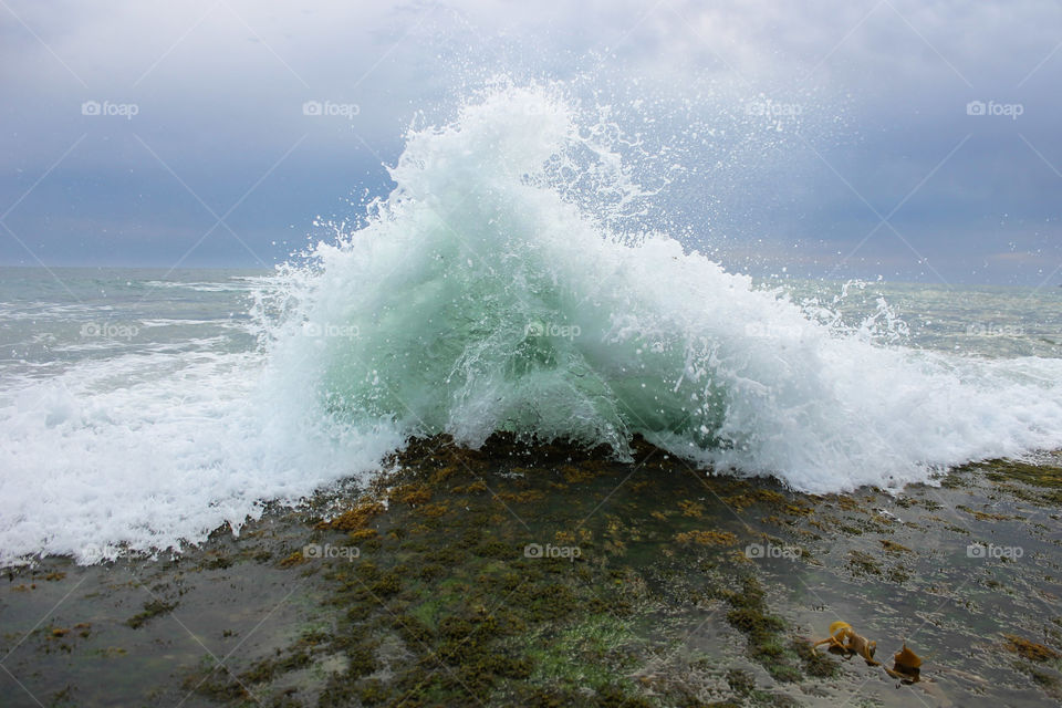 Wave crashing onto Warrnambool foreshore