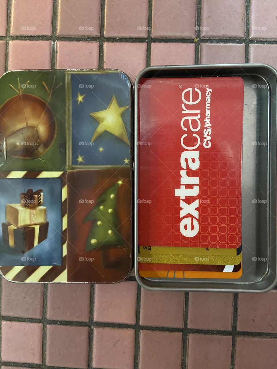 I use old gift card tin boxes to hold store loyalty cards, gift cards, membership cards, and credit cards. They also work great for holding change and folded currency, and don’t take up much space in a purse. This is a great way to repurpose them. 