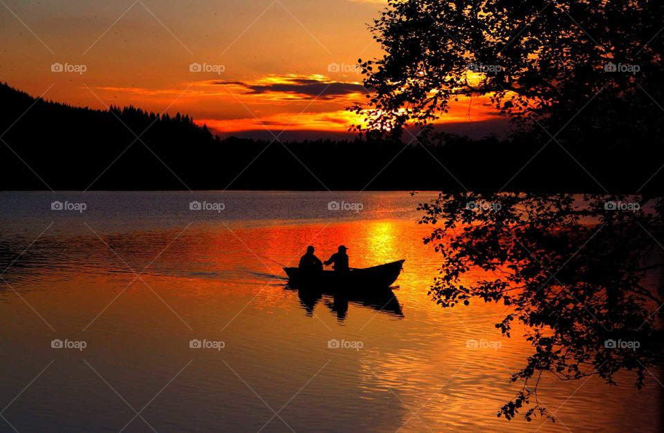 Fishermen at sunset