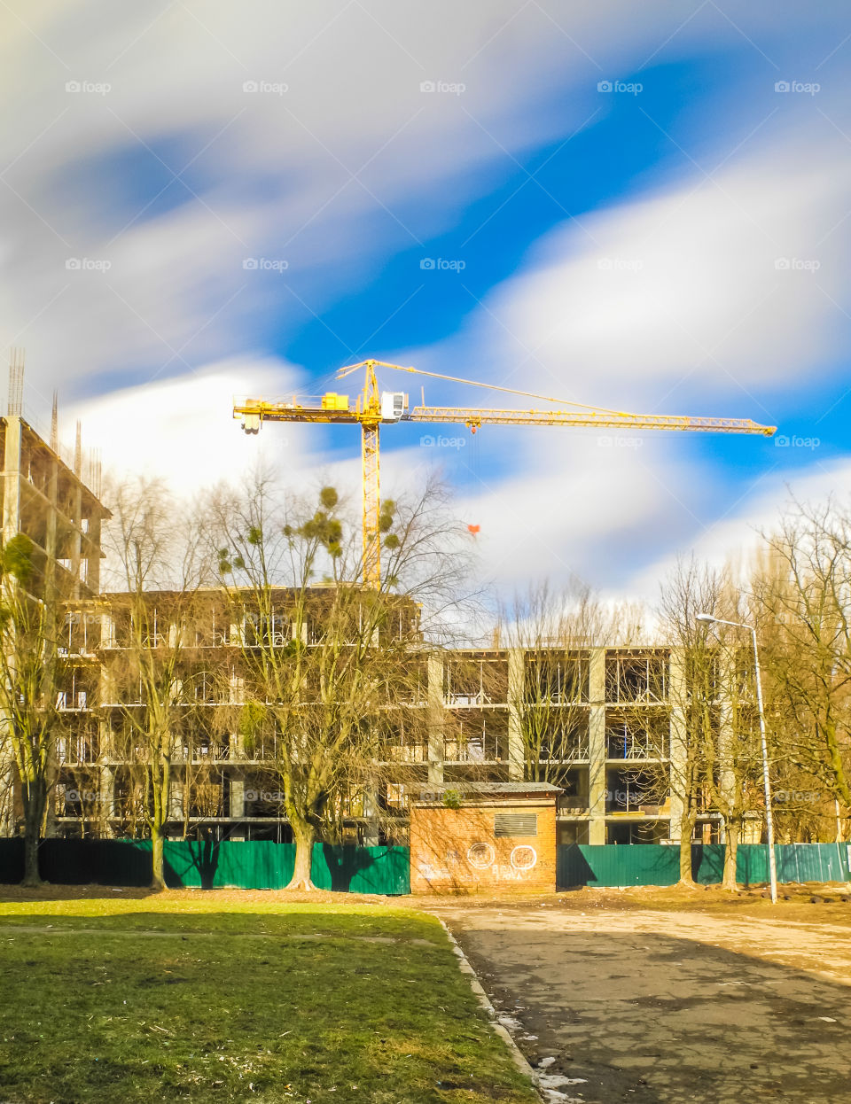 building process with crane on long exposure