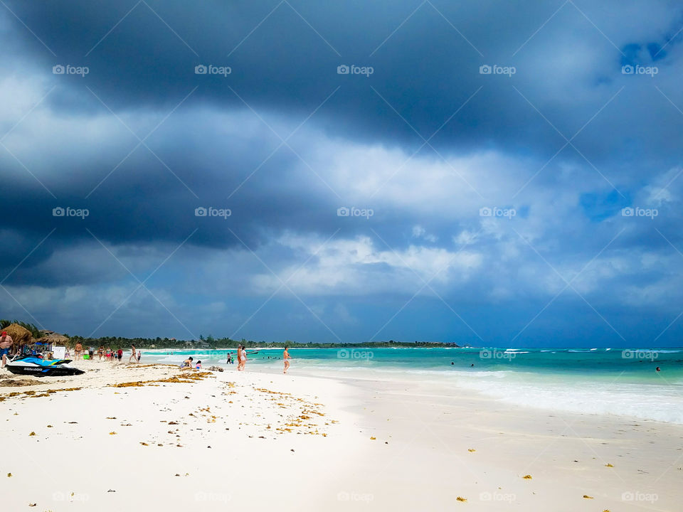 Threatening clouds over Xpu-Ha beach