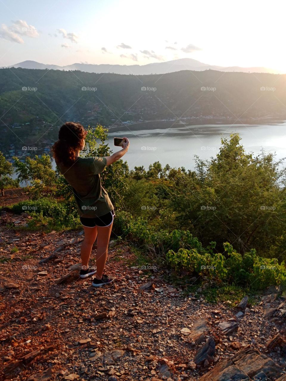 Capturing a sunset from a mountain view to the ocean