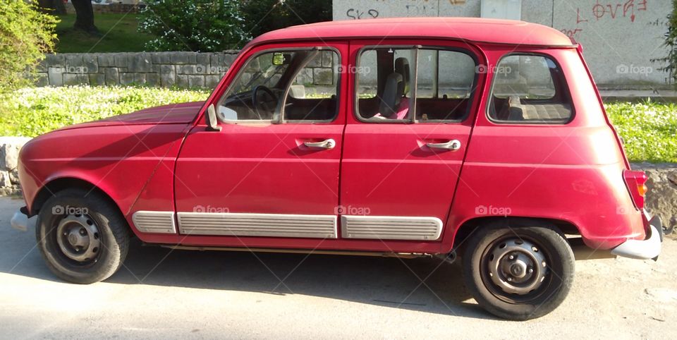 An Old Red Car