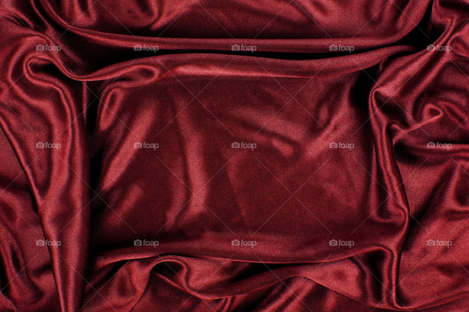 Maroon satin fabric background