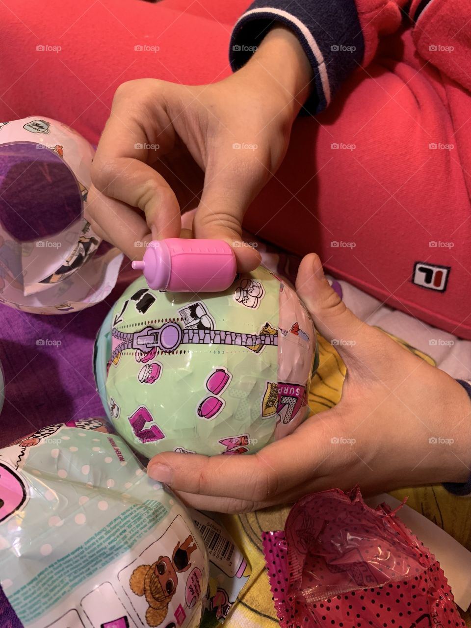 unpacking dolls. What is there inside? under each layer of packaging waiting for a new surprise. Here is the bottle for the doll