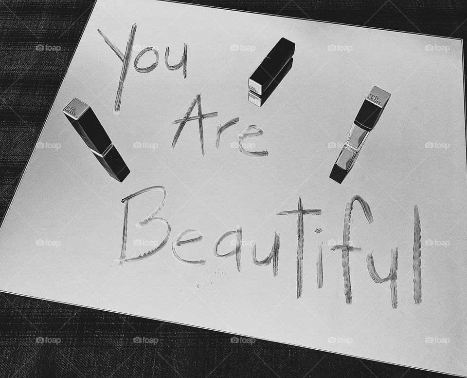 Black and white you are beautiful written on a mirror, messages with lipstick, beautiful women wearing makeup, makeup takes a stand, you are beautiful positive message, monochrome message of beauty, lipstick on a mirror 