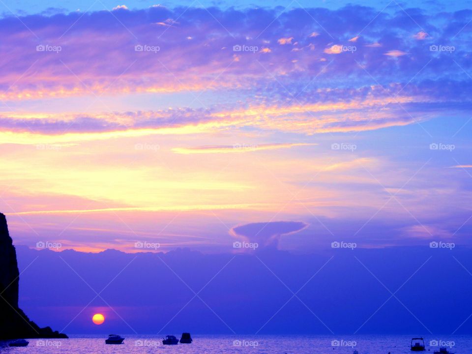 Purple sunset on the Praia beach ( Praia - Italy ).