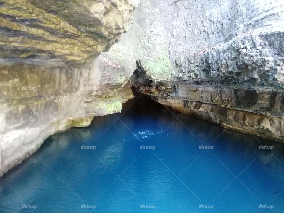 clean spring water coming out of cave. trout water