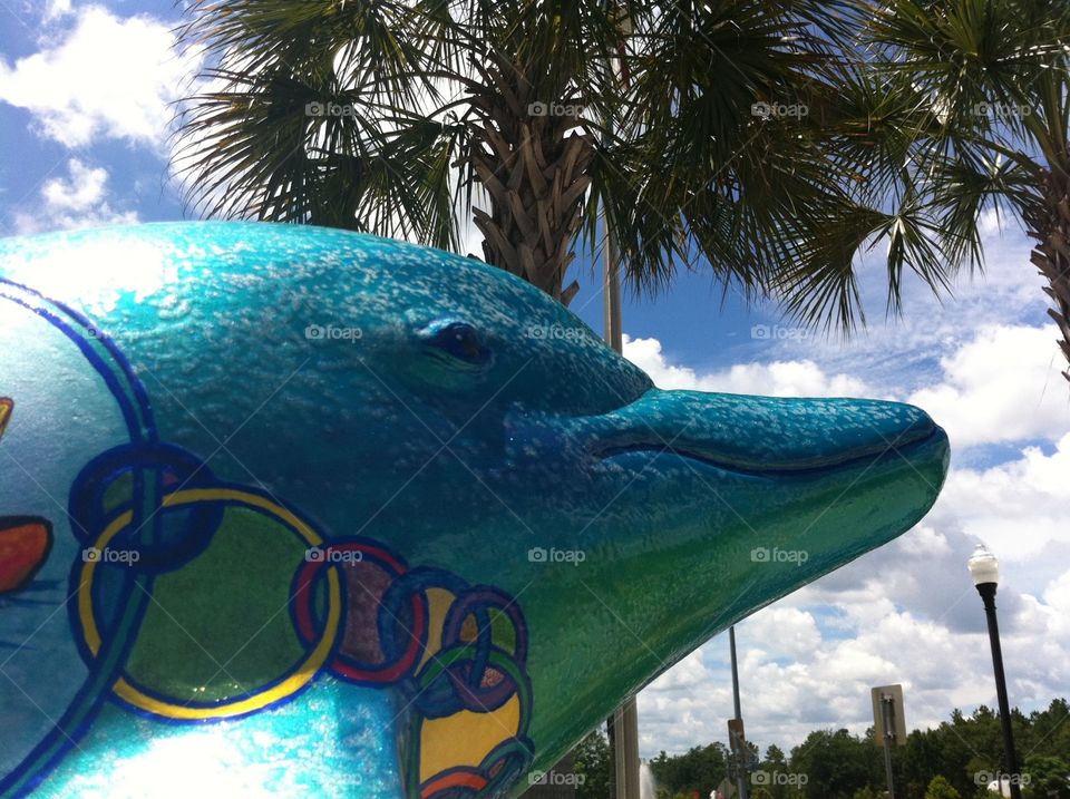 Florida Welcome Dolphin . A pretty, shiny dolphin statue at the Florida Welcome Center. 