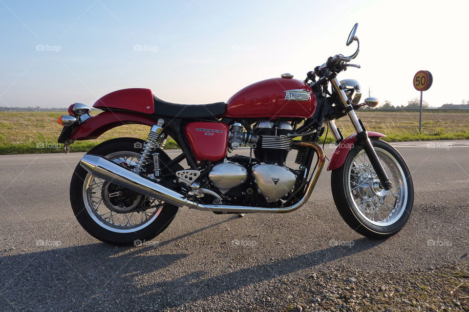 red cafe motorcycle triumph by valmal
